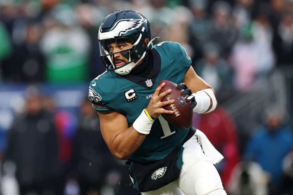 PHILADELPHIA, PENNSYLVANIA - JANUARY 19: Jalen Hurts #1 of the Philadelphia Eagles in action during the NFC Divisional Playoff game against the Los Angeles Rams at Lincoln Financial Field on January 19, 2025 in Philadelphia, Pennsylvania.