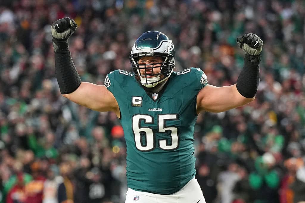 PHILADELPHIA, PENNSYLVANIA - JANUARY 26: Lane Johnson #65 of the Philadelphia Eagles reacts after a touchdown run against the Washington Commanders during the third quarter in the NFC Championship Game at Lincoln Financial Field on January 26, 2025 in Philadelphia, Pennsylvania.