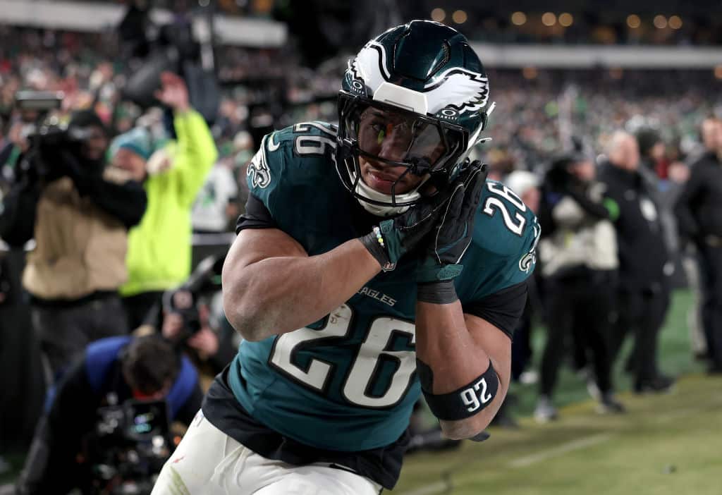 PHILADELPHIA, PENNSYLVANIA - JANUARY 26: Saquon Barkley #26 of the Philadelphia Eagles reacts to his touchdown against the Washington Commanders during the fourth quarter in the NFC Championship Game at Lincoln Financial Field on January 26, 2025 in Philadelphia, Pennsylvania.