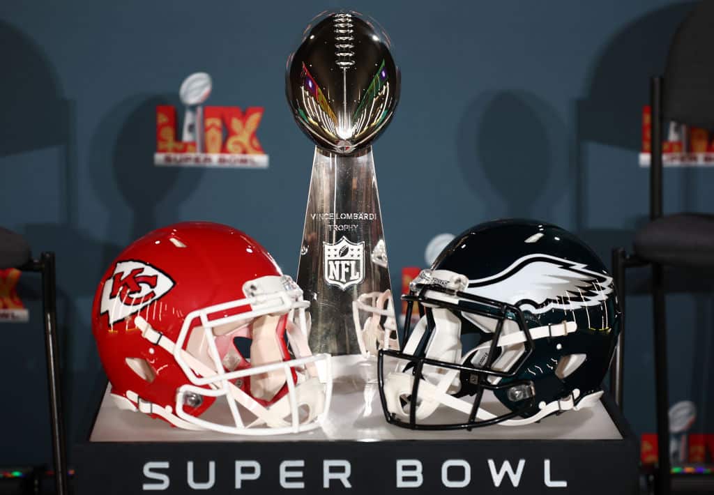 NEW ORLEANS, LOUISIANA - FEBRUARY 03: A Kansas City Chiefs helmet, the Vince Lombardi Trophy and a Philadelphia Eagles helmet are seen before the NFL Commissioner Roger Goodell's Super Bowl Press Conference ahead of Super Bowl LIX at Caesars Superdome on February 03, 2025 in New Orleans, Louisiana.