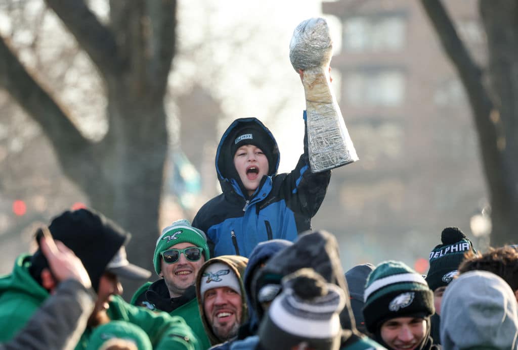 A young fan celebrates ahead of the Philadelphia Eagles Super Bowl Championship Parade