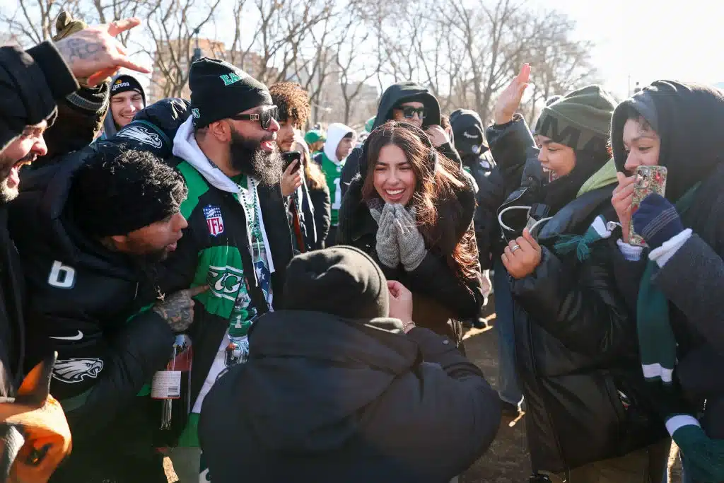 A couple gets engaged near the Philadelphia Museum of Art ahead of the Philadelphia Eagles Super Bowl Championship Parade on Valentine's Day