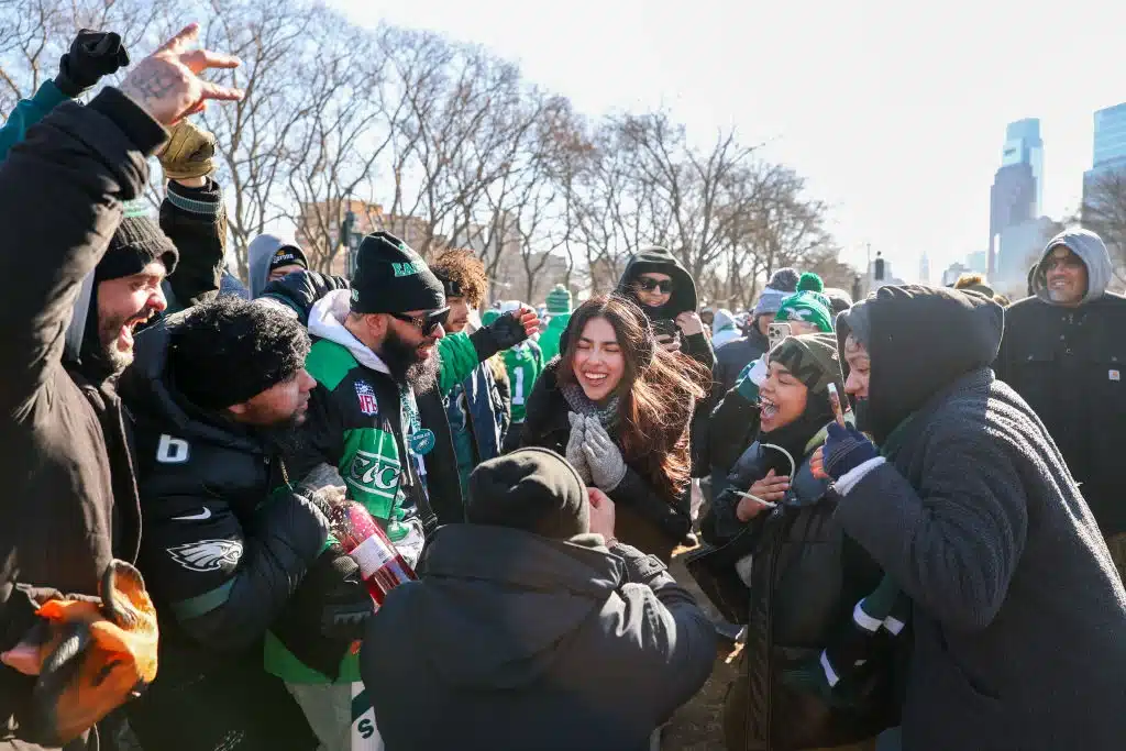 A couple gets engaged near the Philadelphia Museum of Art ahead of the Philadelphia Eagles Super Bowl Championship Parade.