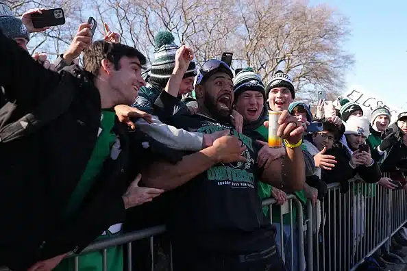 Jordan Mailata #68 of the Philadelphia Eagles celebrates with fans during the Philadelphia Eagles Super Bowl Championship Parade 