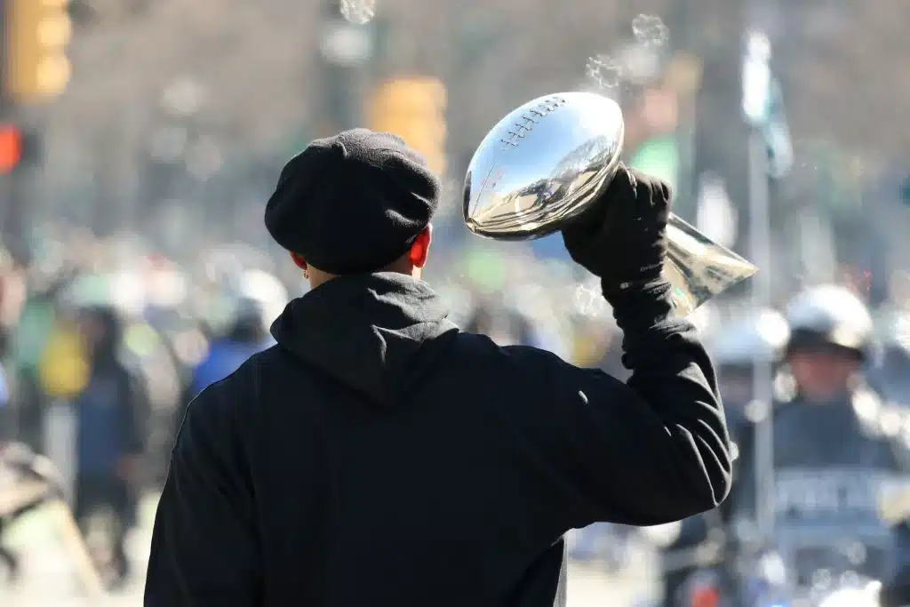 Jalen Hurts #1 of the Philadelphia Eagles holds the Vince Lombardi Trophy during